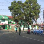 *Anggota Koramil 0106/Menes, Amankan Lomba Gerak Jalan Dalam Rangka HUT Ke-80 RI di Kecamatan Menes*